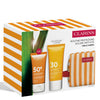 CLARINS Face Cream Spf50 50 M + Body Cream Spf30+ 75 Ml + Trousse Set  3 pz